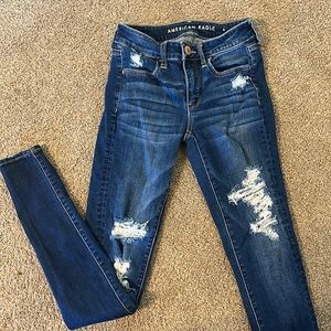 Distressed women’s skinny jeans tall